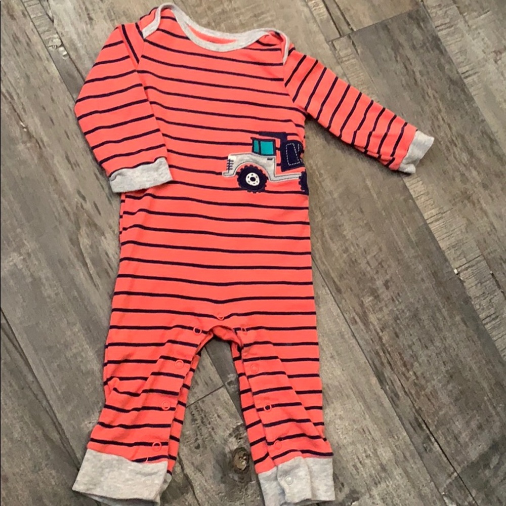 Baby boy orange onesie by Carters size 12 months
